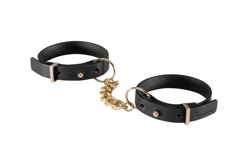 Fekete műbőr bilincs arany lánccal Maze Thincuffs Black